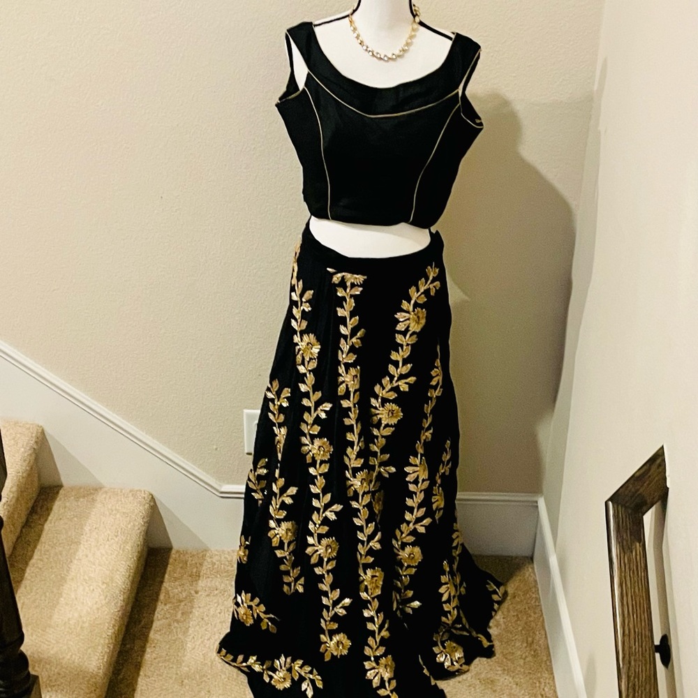 Lehenga Fully Stitched off shoulder blouse & skirt with golden gotta patti work.